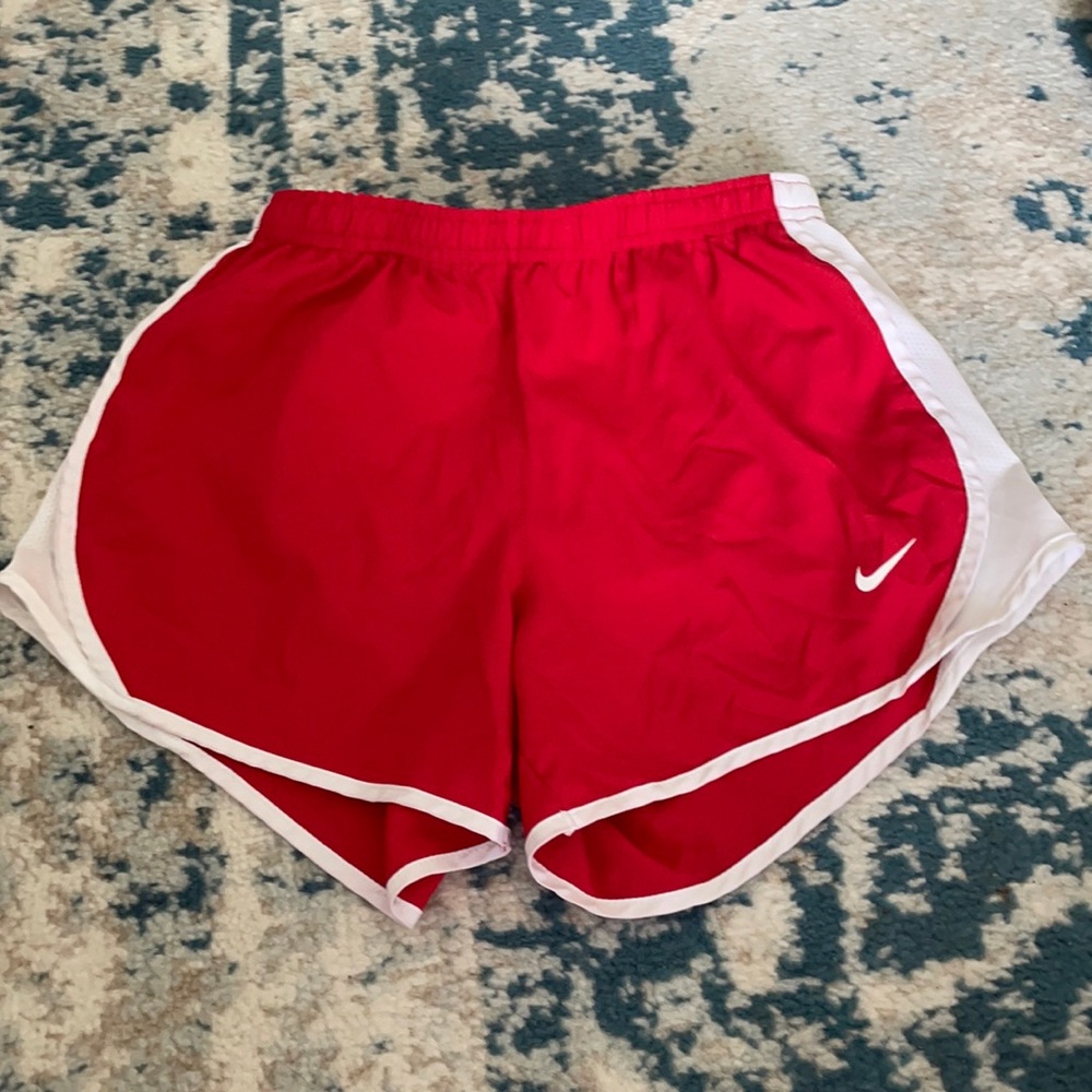 Red Nike shorts
